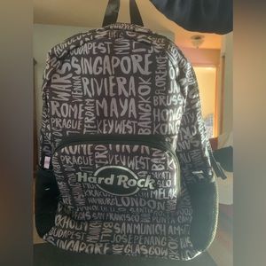 Hard Rock backpack mint condition with reflective emblem.